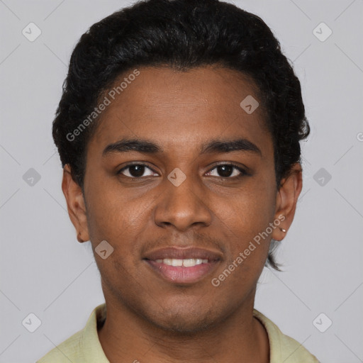 Joyful black young-adult male with short  brown hair and brown eyes