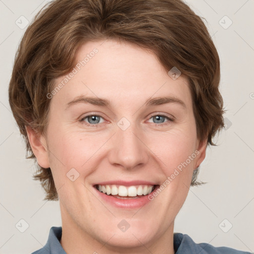 Joyful white young-adult female with medium  brown hair and blue eyes