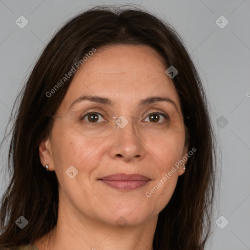 Joyful white adult female with medium  brown hair and brown eyes