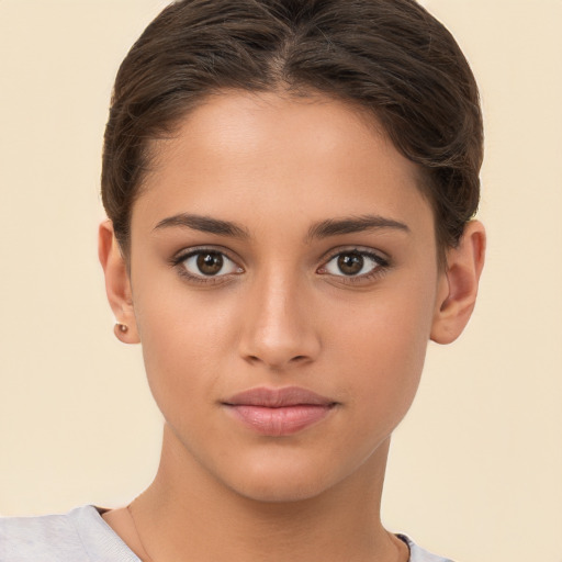 Joyful white young-adult female with short  brown hair and brown eyes