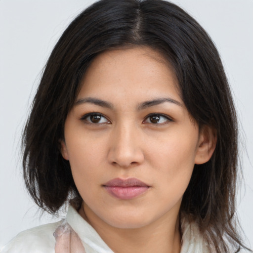 Neutral latino young-adult female with long  brown hair and brown eyes