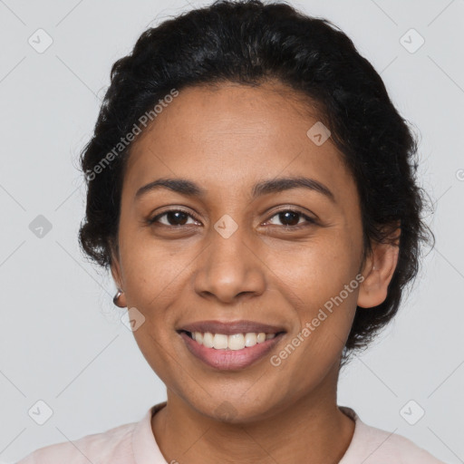 Joyful latino young-adult female with short  black hair and brown eyes