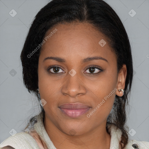 Joyful black young-adult female with medium  brown hair and brown eyes