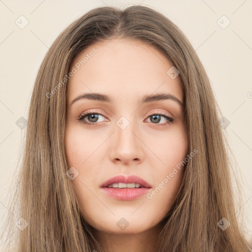 Neutral white young-adult female with long  brown hair and brown eyes