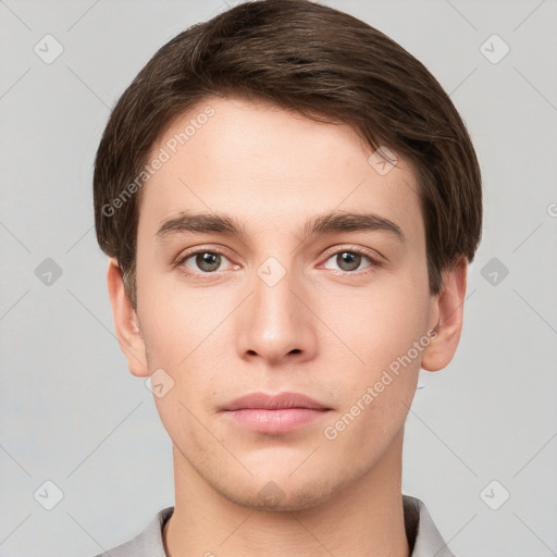 Neutral white young-adult male with short  brown hair and grey eyes