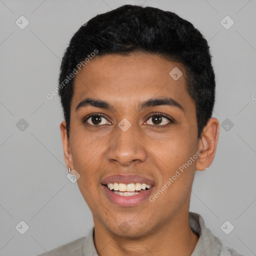 Joyful black young-adult male with short  black hair and brown eyes