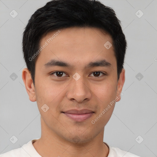 Joyful latino young-adult male with short  brown hair and brown eyes