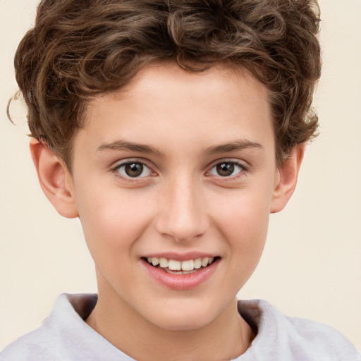 Joyful white child male with short  brown hair and brown eyes