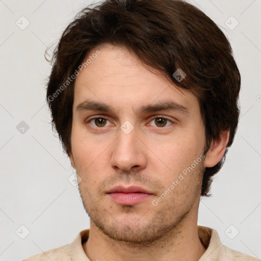 Neutral white young-adult male with short  brown hair and brown eyes