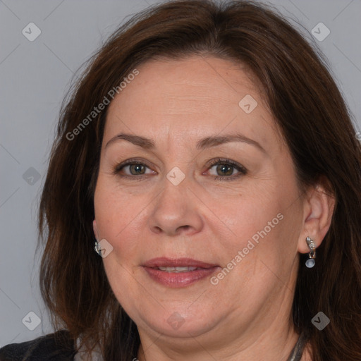 Joyful white adult female with long  brown hair and brown eyes