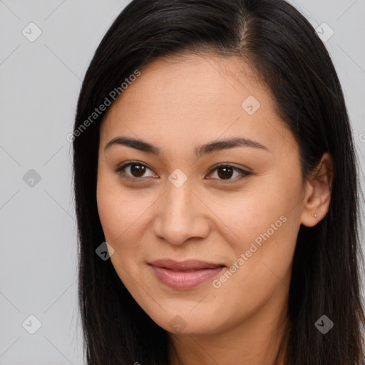 Joyful asian young-adult female with long  brown hair and brown eyes