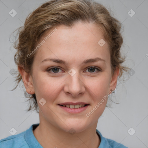 Joyful white young-adult female with medium  brown hair and blue eyes