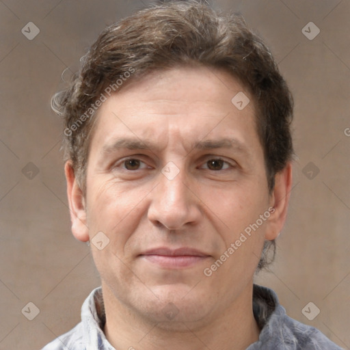 Joyful white adult male with short  brown hair and grey eyes