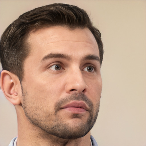 Neutral white young-adult male with short  brown hair and brown eyes