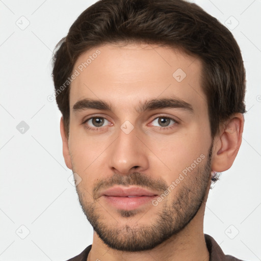 Neutral white young-adult male with short  brown hair and brown eyes