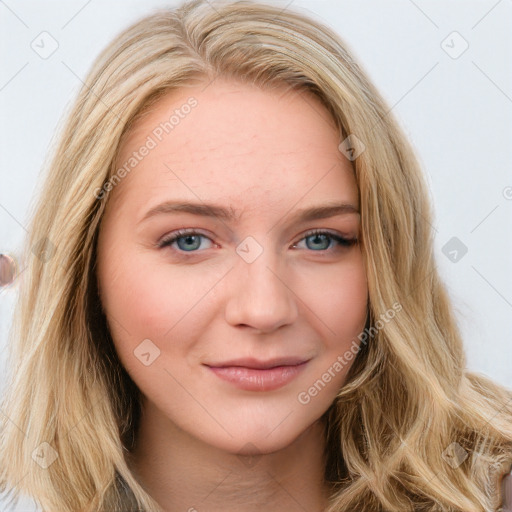 Joyful white young-adult female with long  brown hair and blue eyes