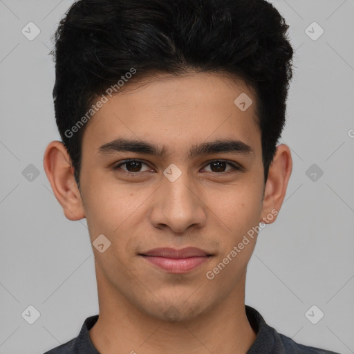 Joyful latino young-adult male with short  brown hair and brown eyes