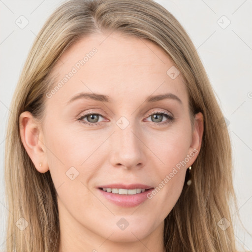 Joyful white young-adult female with long  brown hair and blue eyes