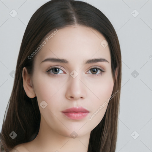 Neutral white young-adult female with long  brown hair and brown eyes