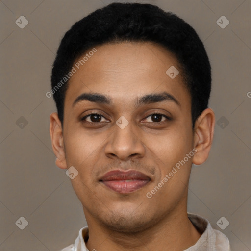 Joyful black young-adult male with short  black hair and brown eyes