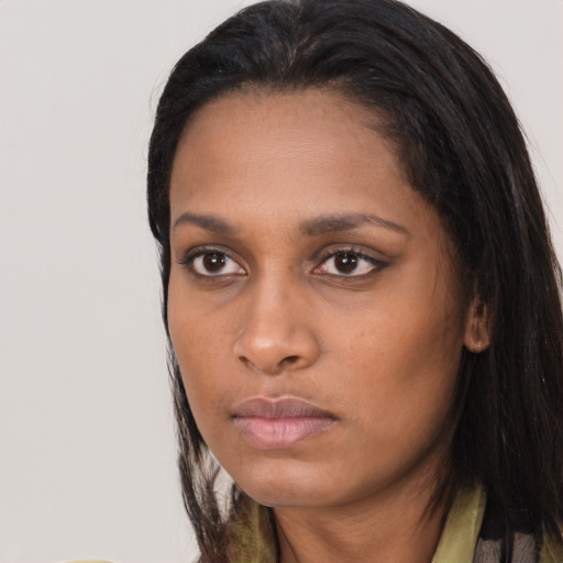 Neutral black young-adult female with long  black hair and brown eyes