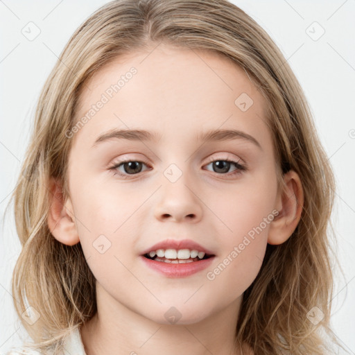 Joyful white child female with medium  brown hair and blue eyes