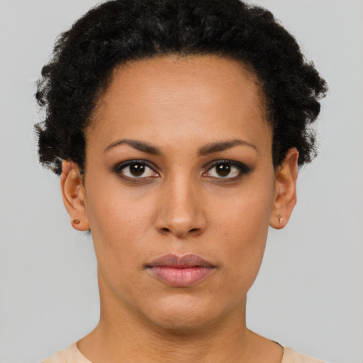 Neutral black young-adult female with short  brown hair and brown eyes