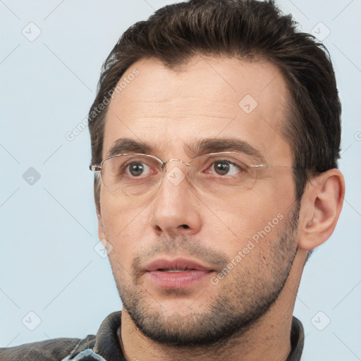 Neutral white adult male with short  brown hair and brown eyes