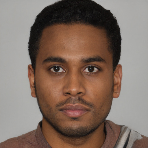 Neutral black young-adult male with short  brown hair and brown eyes