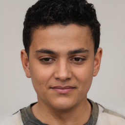 Joyful latino young-adult male with short  brown hair and brown eyes