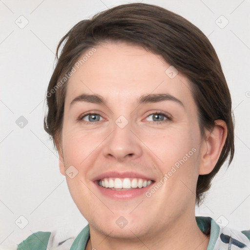 Joyful white young-adult female with medium  brown hair and grey eyes