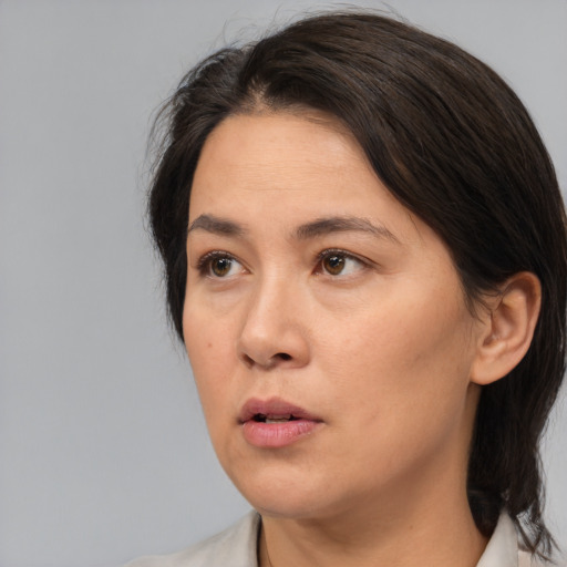 Neutral white adult female with medium  brown hair and brown eyes