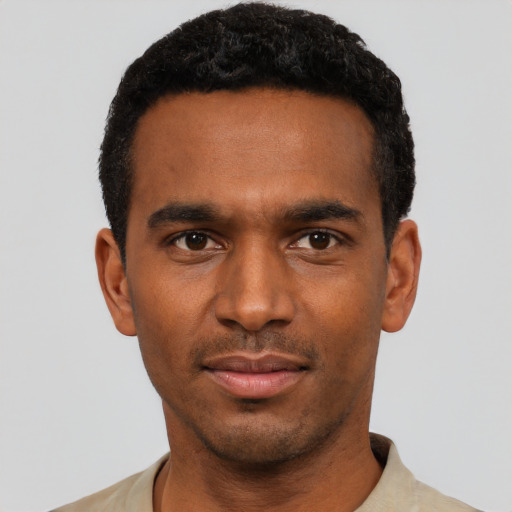 Neutral black young-adult male with short  black hair and brown eyes