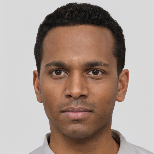 Neutral black young-adult male with short  black hair and brown eyes