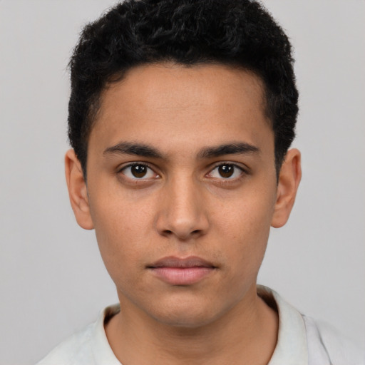 Neutral latino young-adult male with short  black hair and brown eyes