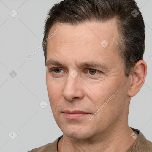 Neutral white adult male with short  brown hair and brown eyes