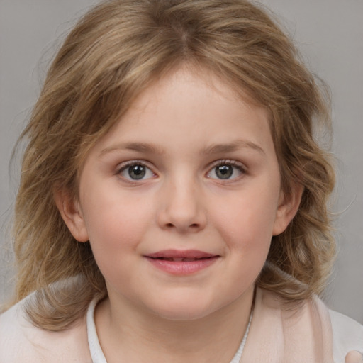 Joyful white child female with medium  brown hair and grey eyes