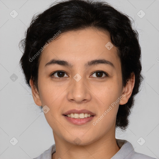 Joyful latino young-adult female with short  brown hair and brown eyes