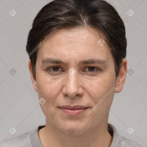 Joyful white adult female with short  brown hair and brown eyes