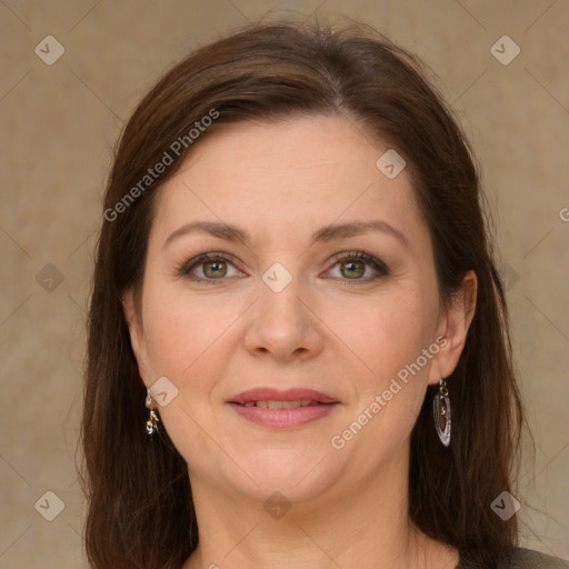 Joyful white young-adult female with long  brown hair and green eyes