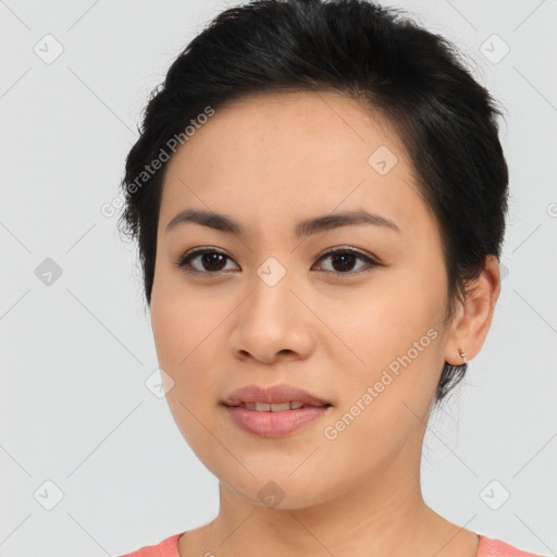 Joyful asian young-adult female with medium  black hair and brown eyes