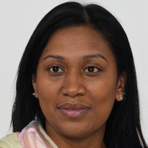 Joyful asian adult female with long  brown hair and brown eyes