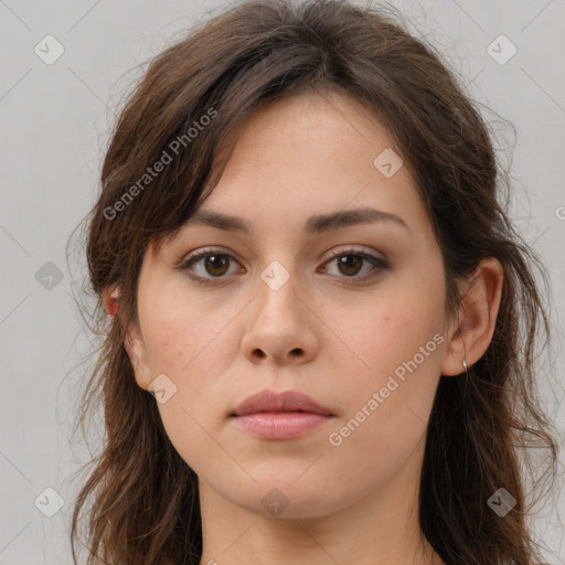 Neutral white young-adult female with long  brown hair and brown eyes