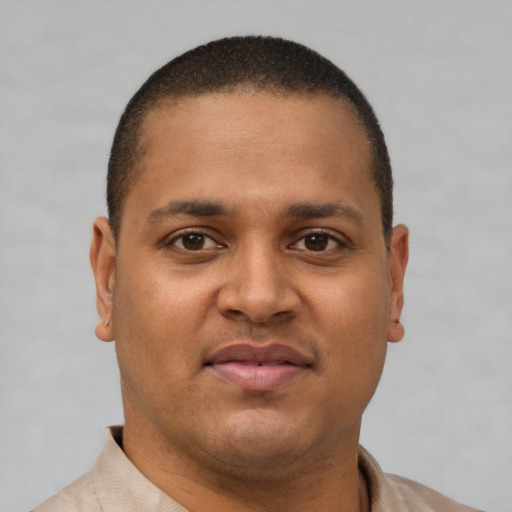Neutral latino young-adult male with short  brown hair and brown eyes