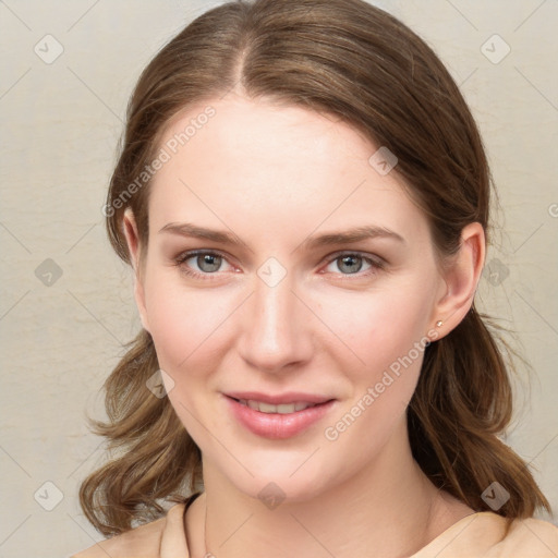 Joyful white young-adult female with medium  brown hair and blue eyes