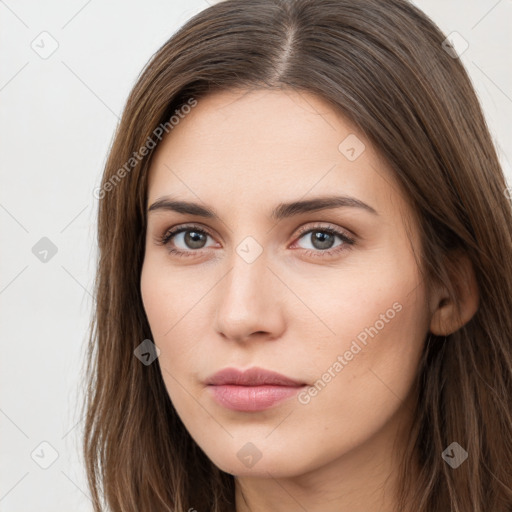 Neutral white young-adult female with long  brown hair and brown eyes