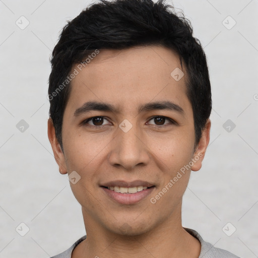 Joyful white young-adult male with short  black hair and brown eyes