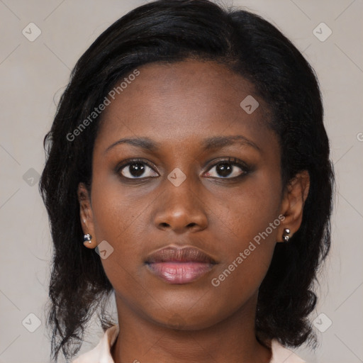 Neutral black young-adult female with medium  black hair and brown eyes