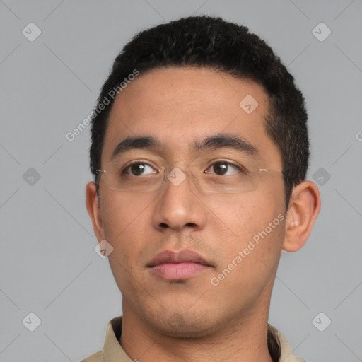 Neutral white young-adult male with short  black hair and brown eyes