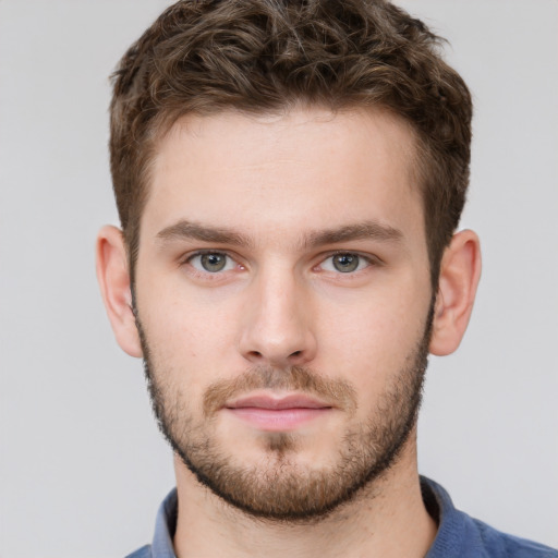 Neutral white young-adult male with short  brown hair and grey eyes